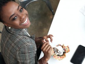 Happy Centreville dentist patient smiling from dental crowns