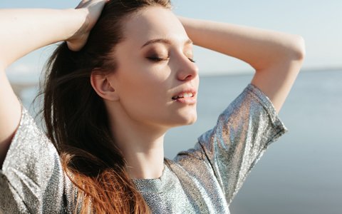 Smiling woman who received Botox in Centreville